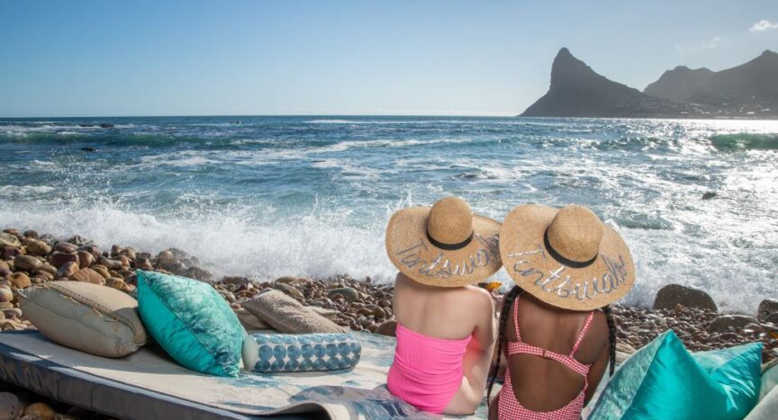 photo of ladies enjoying the beach