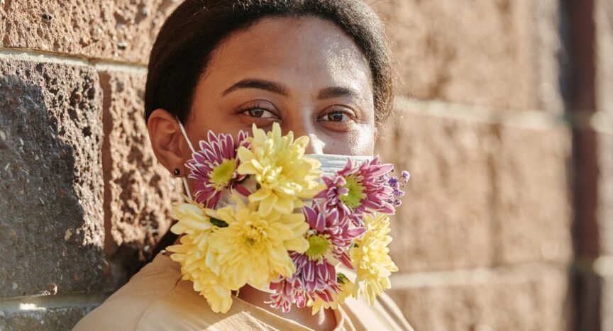 Lady wearing flower mask